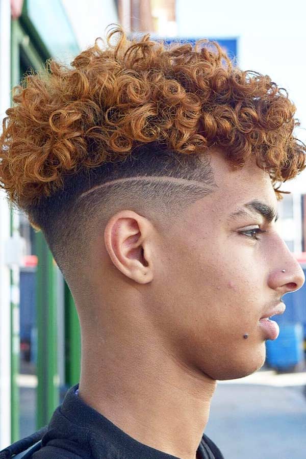 taper fade curly faux hawk