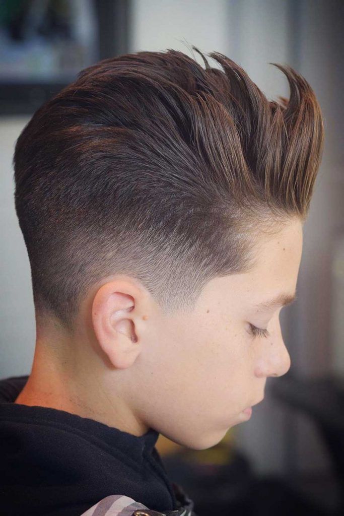 60 Trendiest Boys Haircuts And Hairstyles Menshaircuts Com The best way to describe this look would be rather than styling it with a standard slick back on both sides, we allowed the hair under the part to lay in its natural flow — forward. boys haircuts and hairstyles