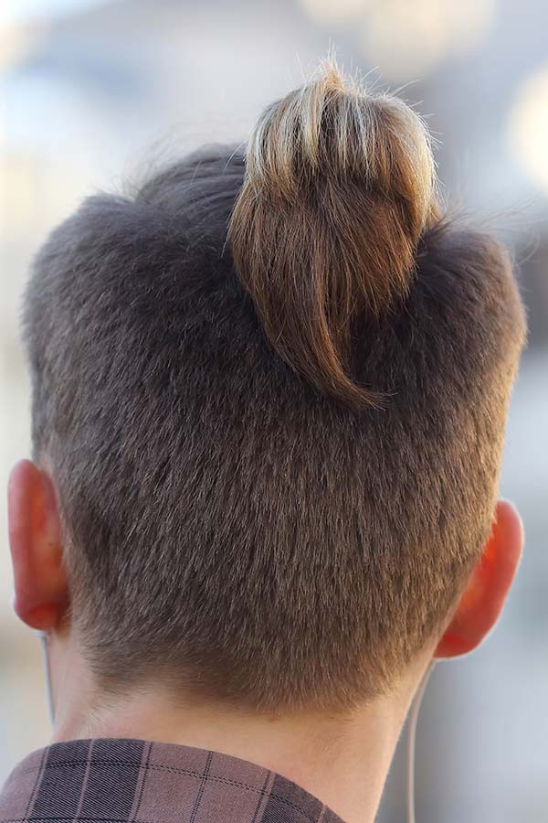 Undercut Ponytail Boy Wearing an undercut ponytail is a statement no doubt