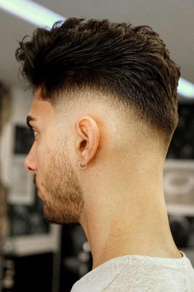 What's the best possible haircut for an oval faced man with curly/wavy dark  brown hair? - Quora