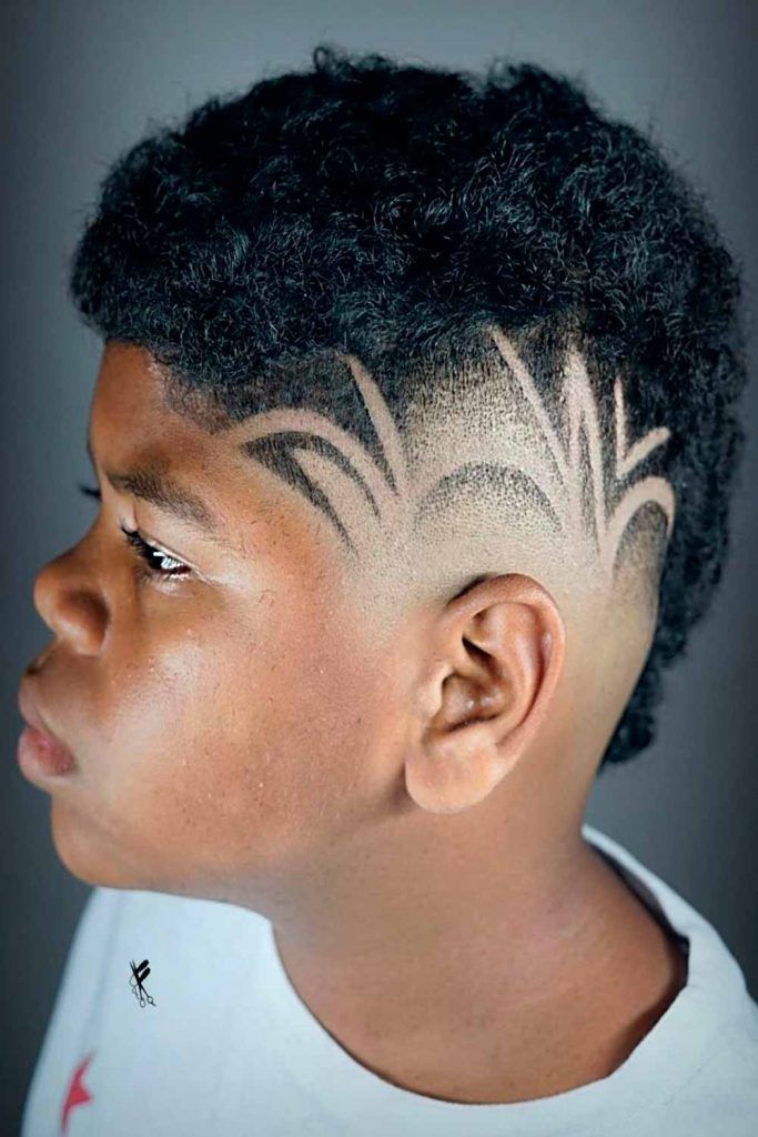 Faded Mohawk With Design Black Boys Haircuts #blackboyshaircuts #boyshaircuts #haircutsforblackboys