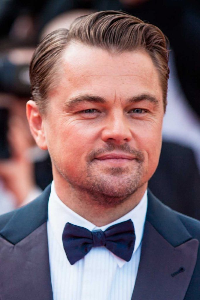 business haircut long comb over leonardo dicaprio