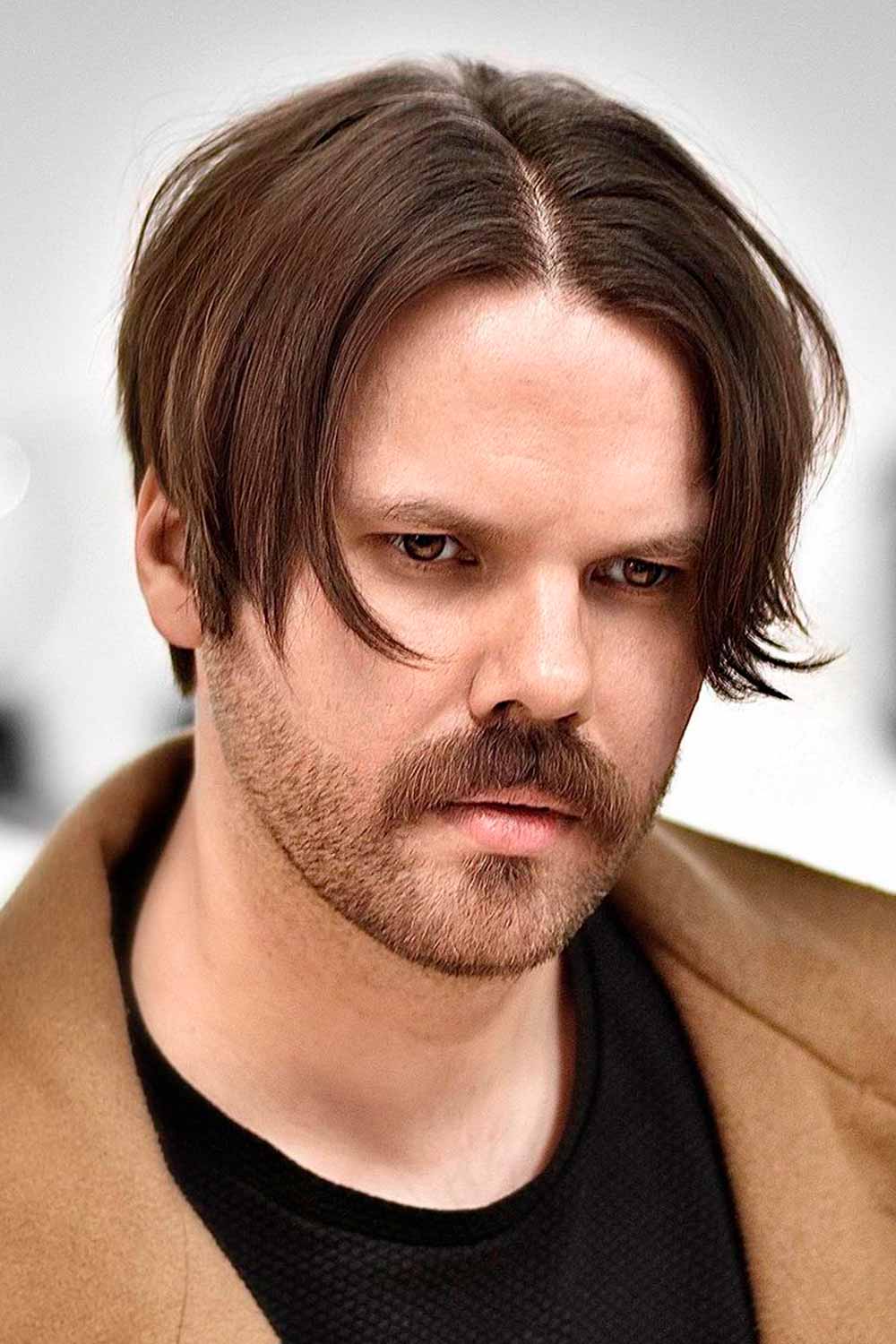 25 Middle Part Hairstyles For Men To Rock