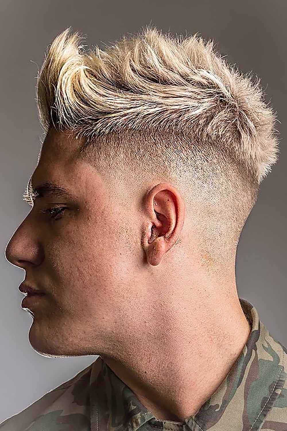 Blonde Faux Hawk #blondemenhaircuts #blondehaircut #menhaircut #blondemen