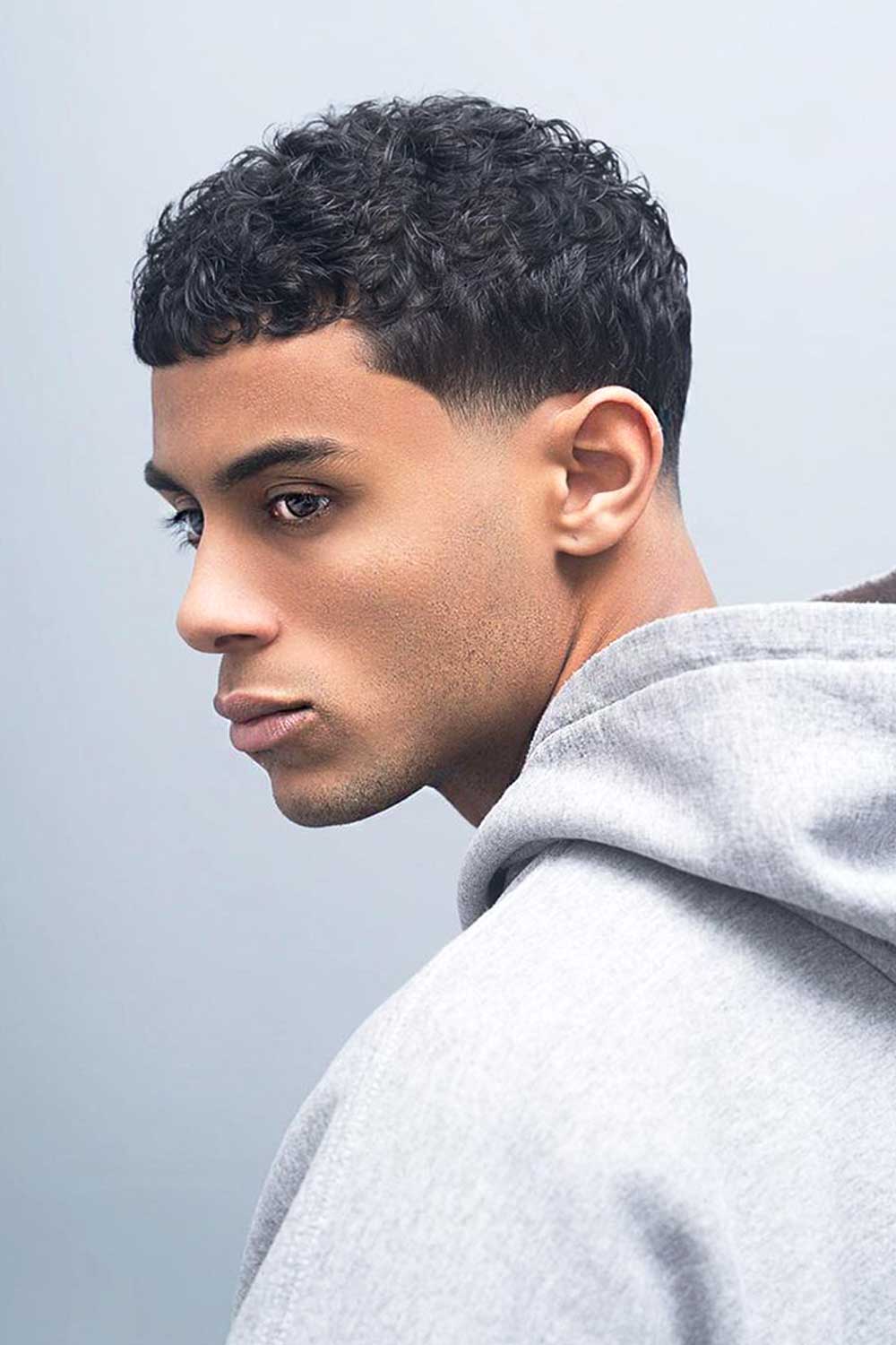 Low Fade Haircut Curly Textured Short 