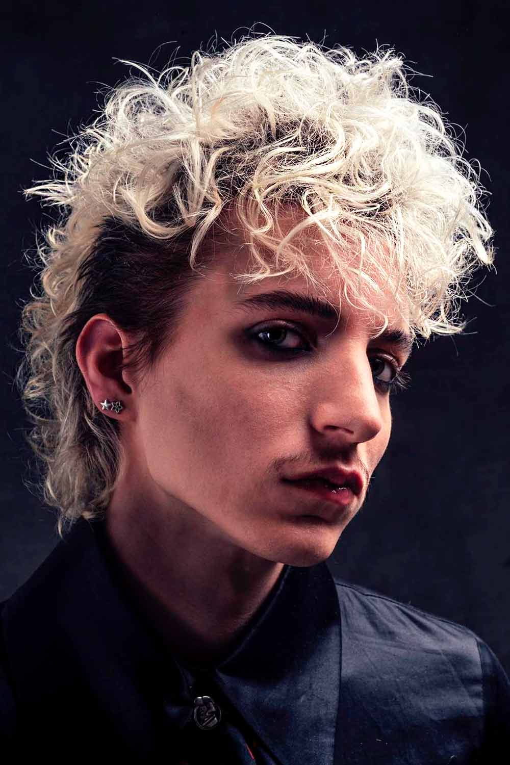 punk hairstyle undercut curly bangs shaggy tapered black blonde