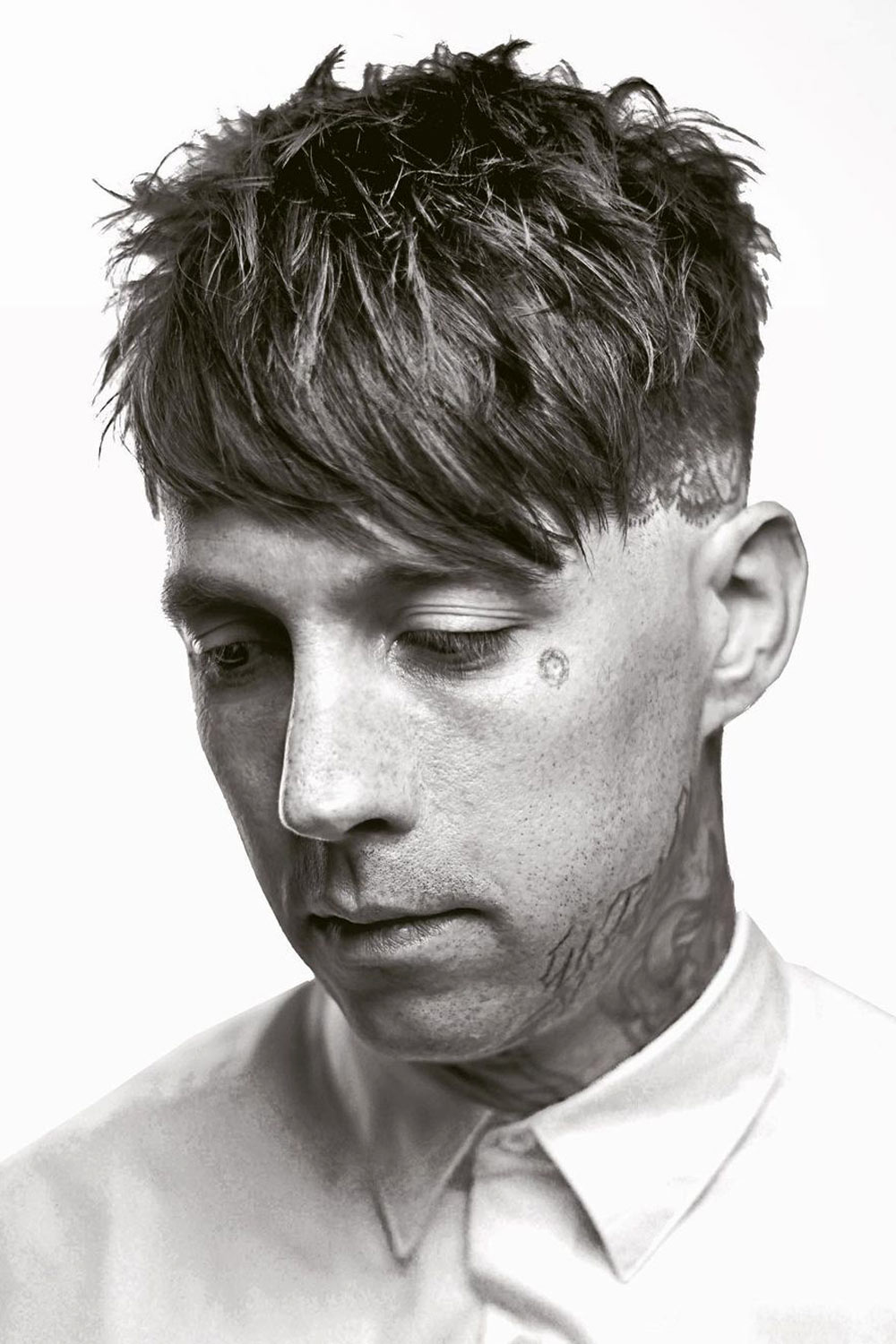 30 Layered Haircuts For Men With FAQs And Examples